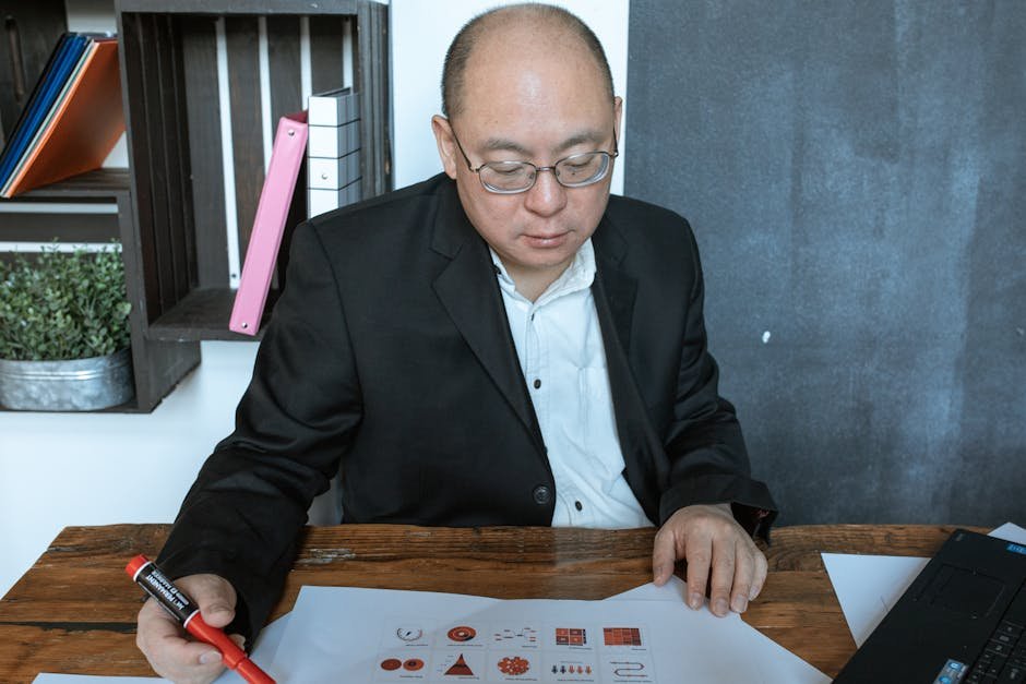 Guy Reading Charts